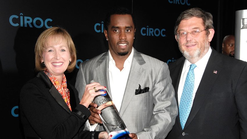 Musical artist and entrepreneur Sean “Diddy Combs,” along with Diageo Chief Marketing Officer Debra Kelly Ennis, left, and Executive Vice President Guy Smith, right, as Diddy announces his partnership with Diageo North America and Ciroc Premium Vodka at a press conference at Stone Rose at the Time Warner Center in New York City on Oct. 24, 2007.