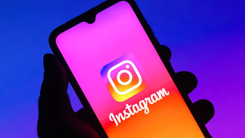 In this photo illustration the Instagram logo is seen displayed on a smartphone.