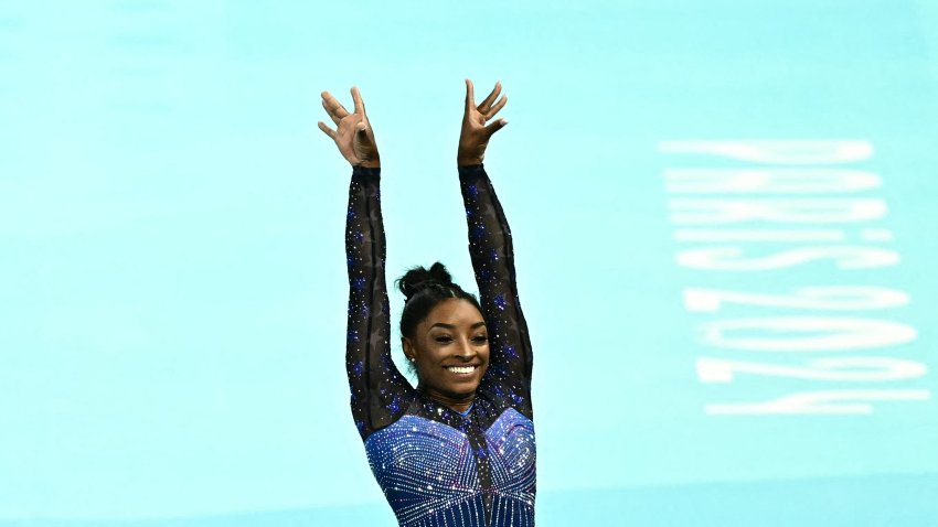 Simone Biles reacts after competing in the vault event of the artistic gymnastics women's all around final during the Paris 2024 Olympic Games at the Bercy Arena in Paris, on August 1, 2024.