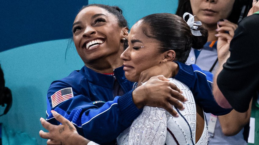 Simone Biles of USA (L) and Jordan Chiles of USA (R) celebrate silver and bronze medals for USA while women´s floo exercise final on day ten of the Olympic Games Paris 2024 at Bercy Arena on August 05, 2024 in Paris, France.